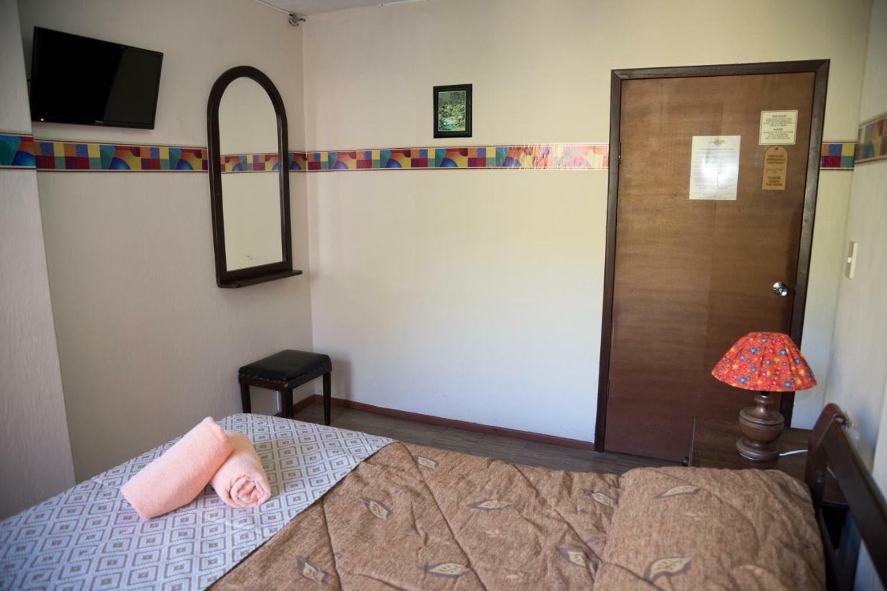 Hotel Flor de Oriente Baños Buitenkant foto